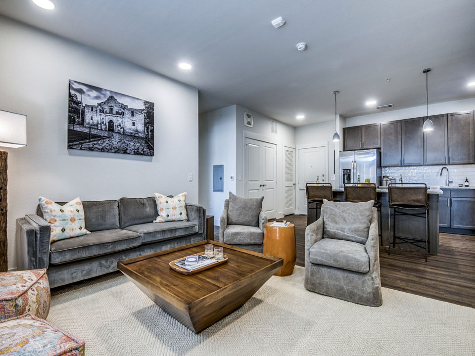 Modern living room with stylish decor at Vecina Apartment Villas, showcasing comfort and luxury for urban living