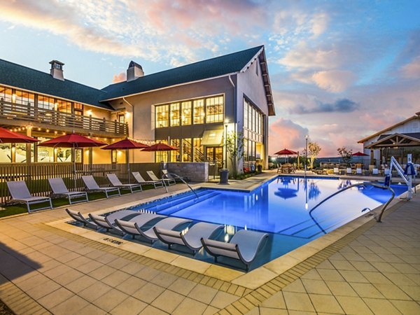 Resort-style pool with elegant cabanas at Vecina Apartment Villas offering luxury living experience
