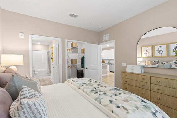Bedroom featuring contemporary design and large windows at Marlowe South Tampa Apartments