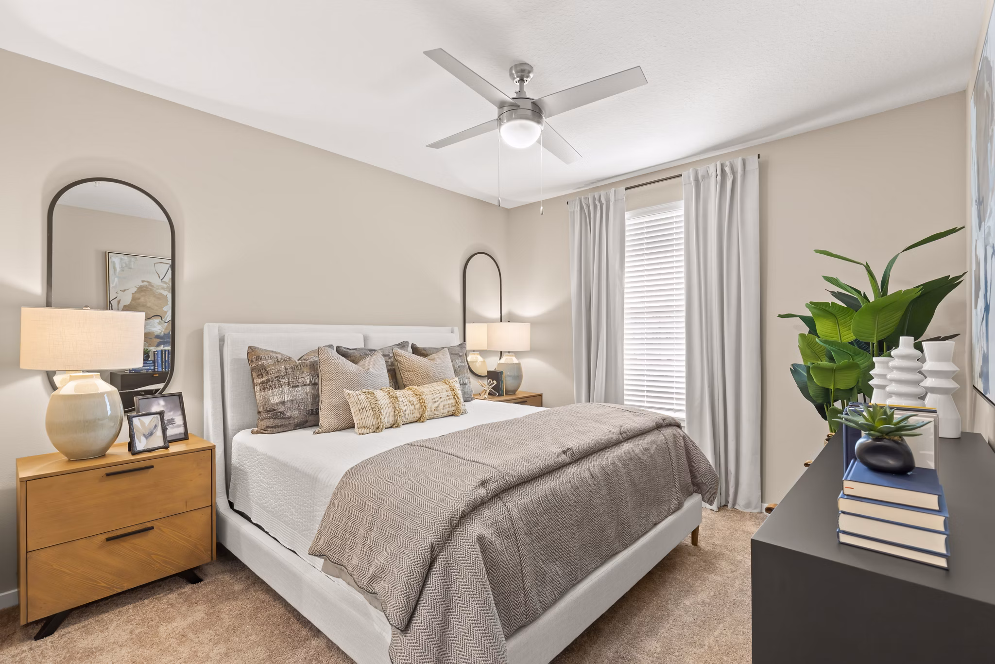 Marlowe South Tampa Apartments: Cozy bedroom with stylish decor and ample natural light