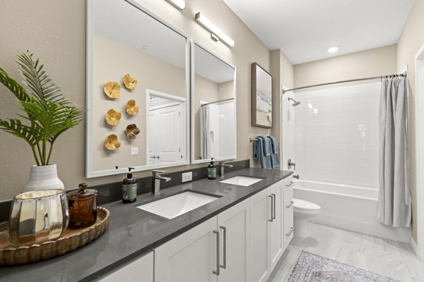 Contemporary bathroom featuring sleek fixtures at Marlowe South Tampa Apartments