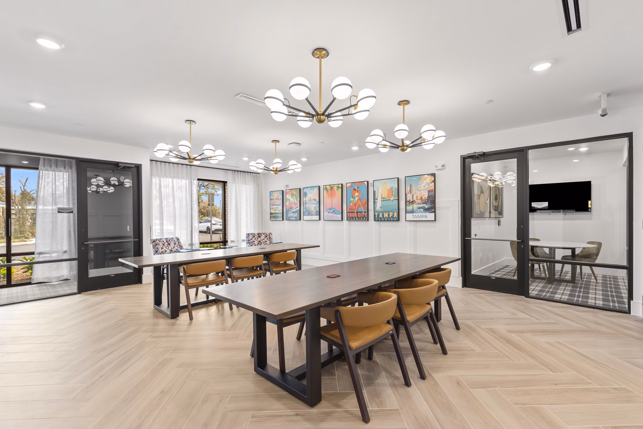 Modern clubhouse with luxurious interiors at Marlowe South Tampa Apartments, ideal for social gatherings and relaxation