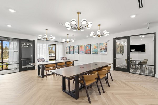Modern clubhouse with luxurious interiors at Marlowe South Tampa Apartments, ideal for social gatherings and relaxation
