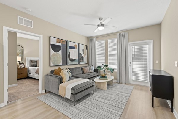 Spacious living room with modern decor in Marlowe South Tampa Apartments