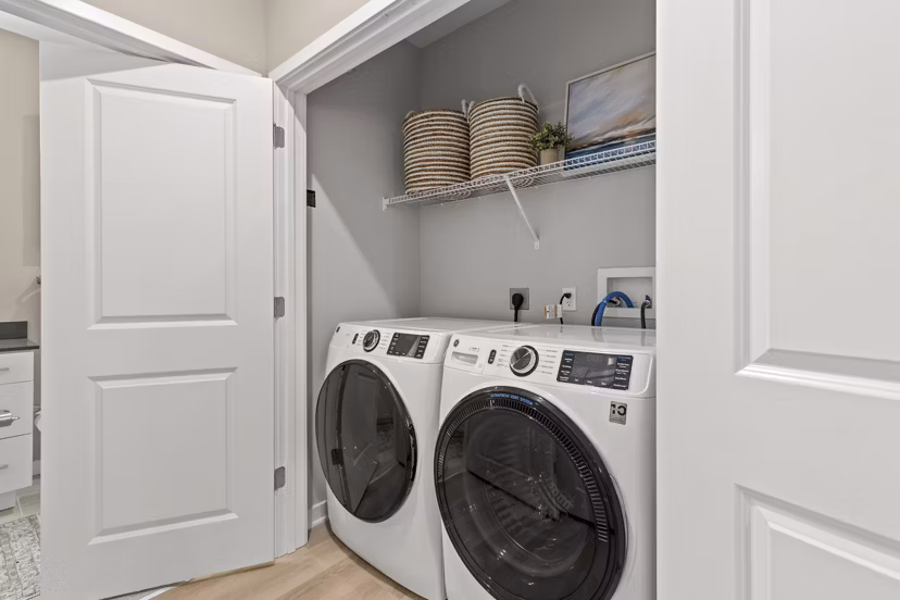 Laundry facilities with high-efficiency washers and dryers at Marlowe South Tampa Apartments, offering convenience for residents