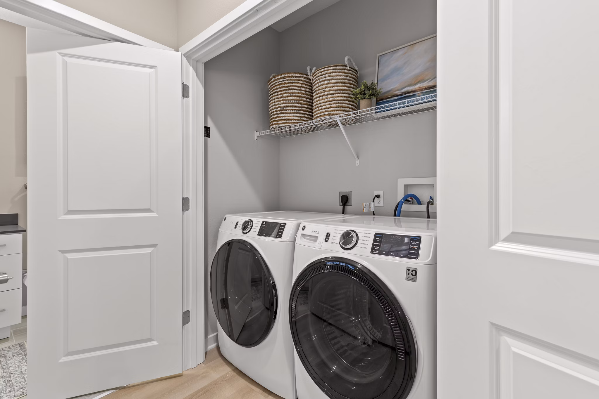 Laundry facilities with high-efficiency washers and dryers at Marlowe South Tampa Apartments, offering convenience for residents