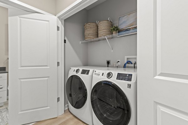Laundry facilities with high-efficiency washers and dryers at Marlowe South Tampa Apartments, offering convenience for residents