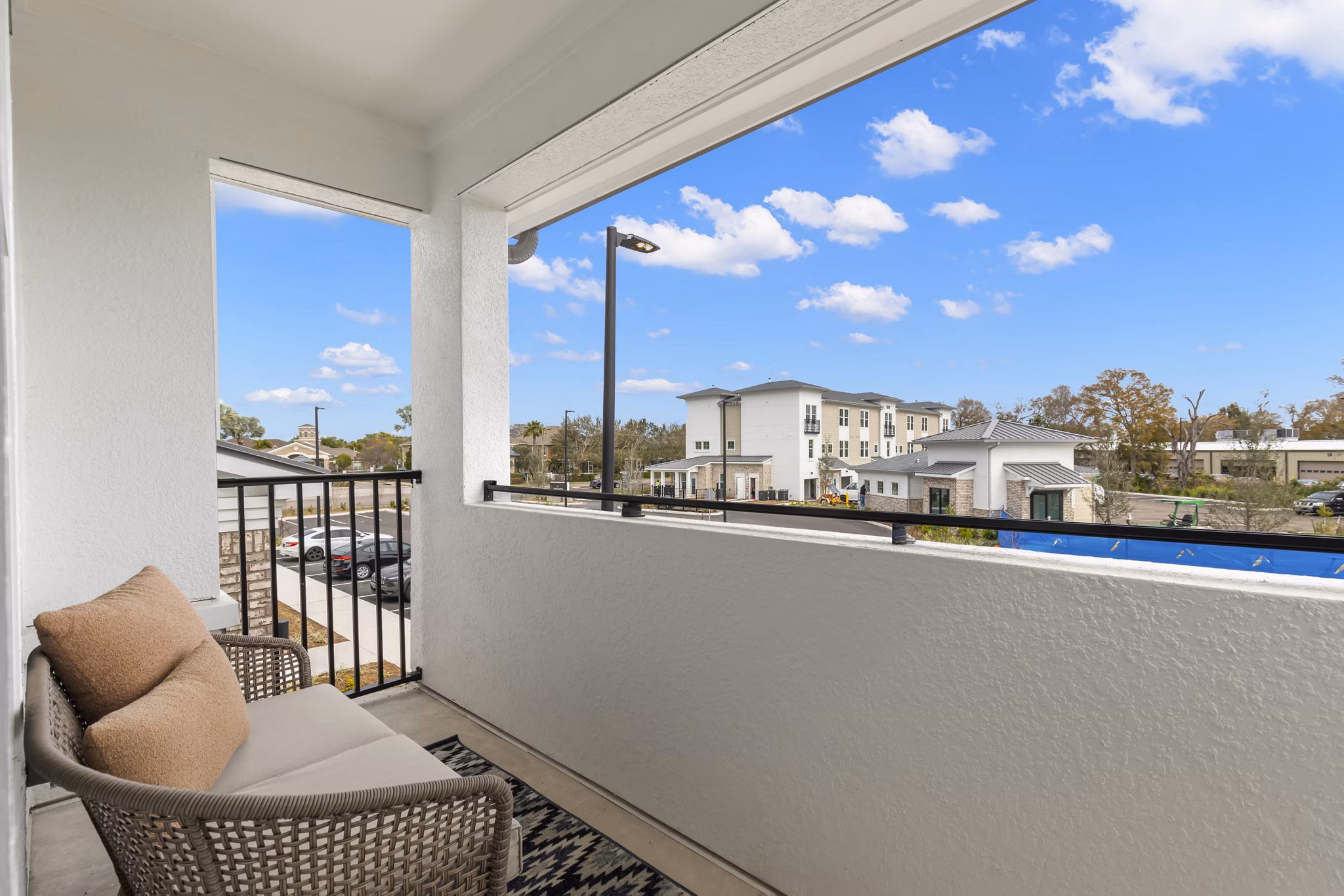 Patio featuring stylish seating at Marlowe South Tampa Apartments