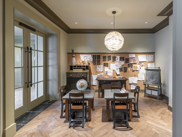 Elegant clubhouse with modern decor at The Commodore Apartments in vibrant city location