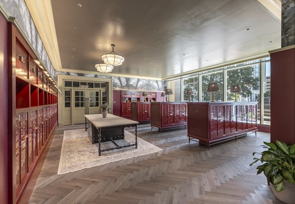 Modern mail room with organized mailboxes at The Commodore Apartments, offering convenience and efficiency for residents