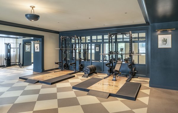 State-of-the-art fitness center with modern equipment at The Commodore Apartments