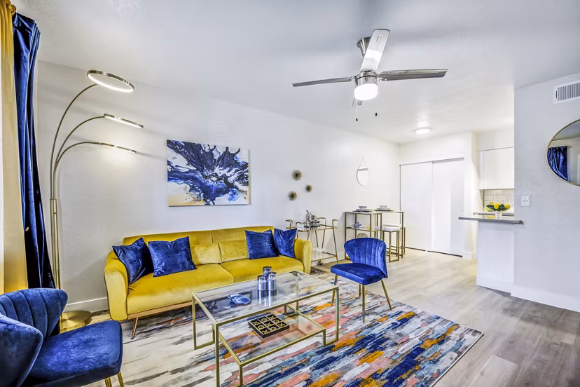 Spacious living room with modern decor at Monterey Village Apartments in luxury Greystar community