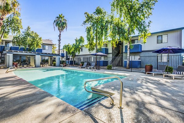 Resort-style pool area at Monterey Village Apartments