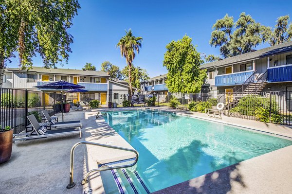 Luxury pool with cabanas at Monterey Village Apartments