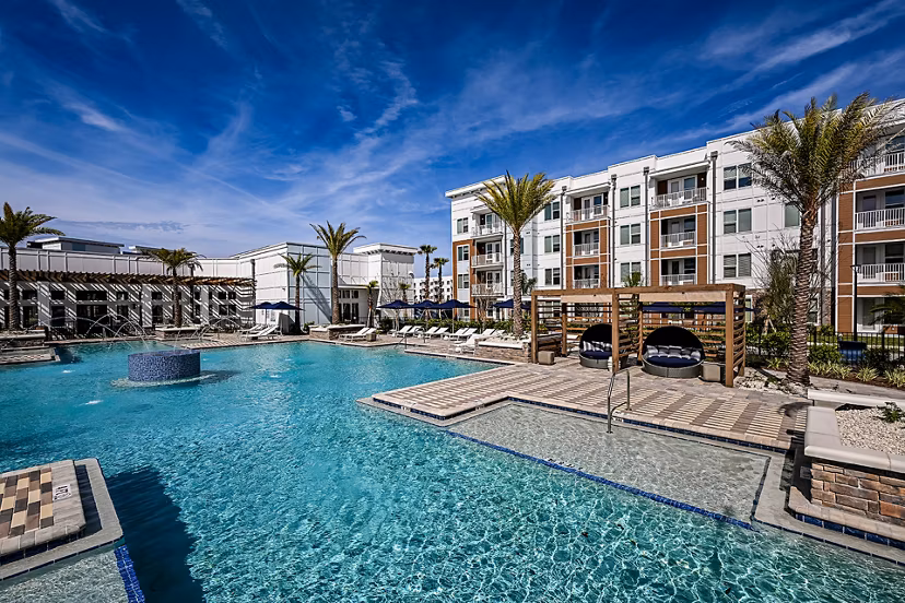 Resort-style pool at Aspire at Silverleaf Apartments offering luxury living in a serene environment