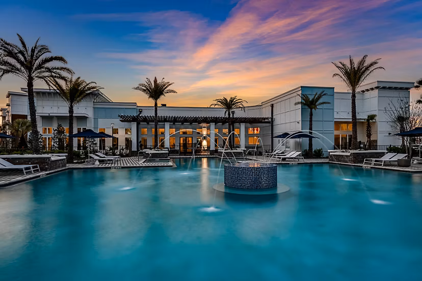 Resort-style pool at Aspire at Silverleaf Apartments offering relaxation and recreation for residents