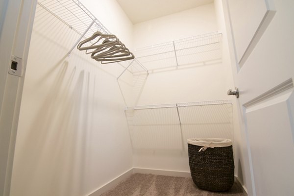 Spacious closet with shelving at Sage North Apartments, ideal for organized living and storage solutions