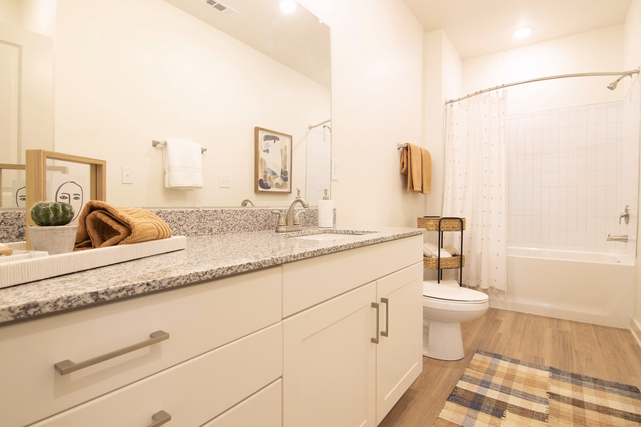 Bathroom featuring modern fixtures at Sage North Apartments