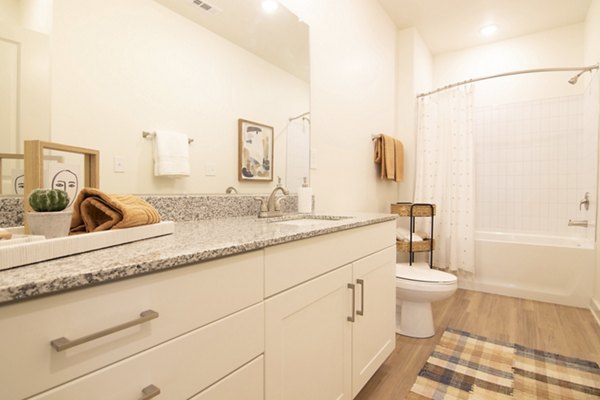 Bathroom featuring modern fixtures at Sage North Apartments