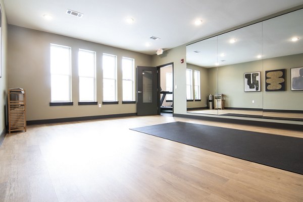 State-of-the-art fitness center at Prose Buda Apartments with modern equipment and workout spaces