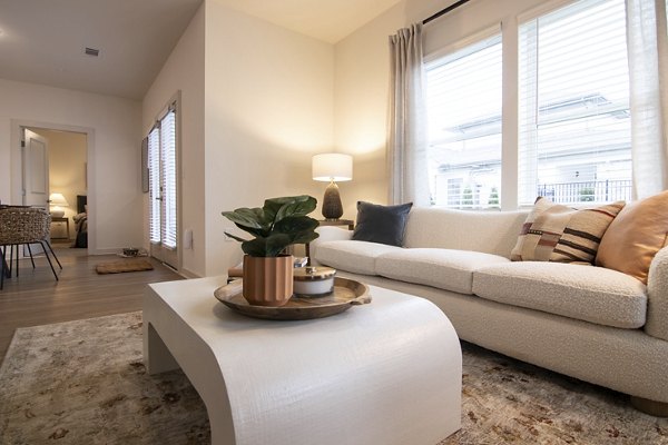 Modern living room with chic decor at Sage North Apartments
