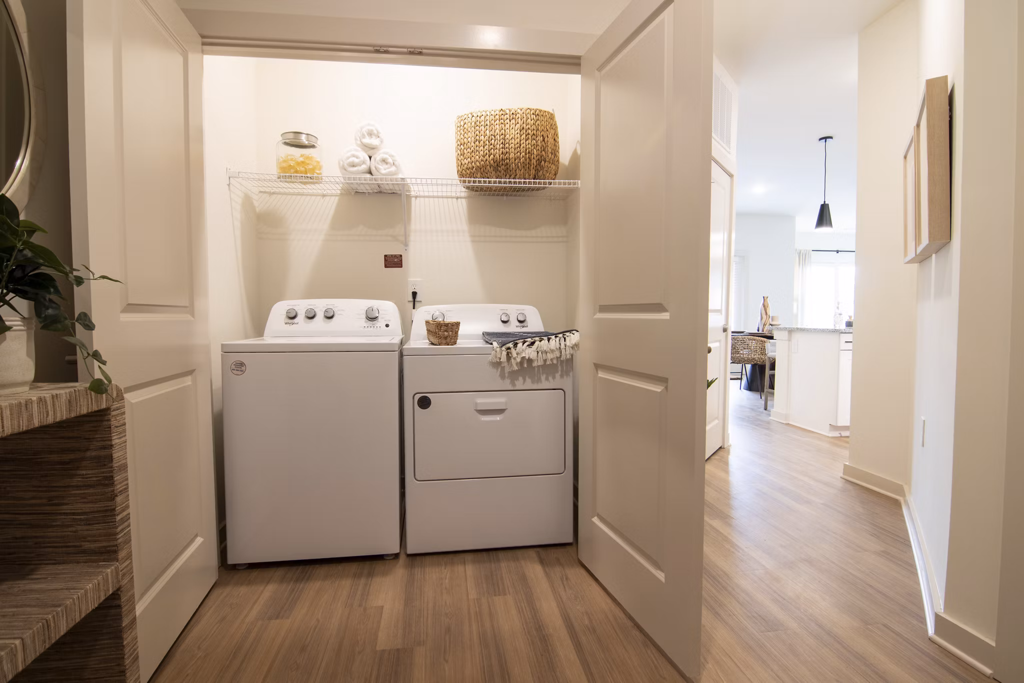 Laundry room with state-of-the-art washers and dryers at Sage North Apartments