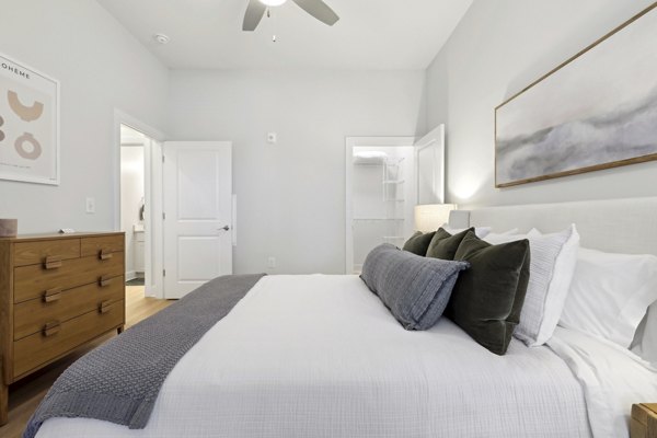 Bedroom featuring modern decor and ample natural light at 3500 West View Apartments