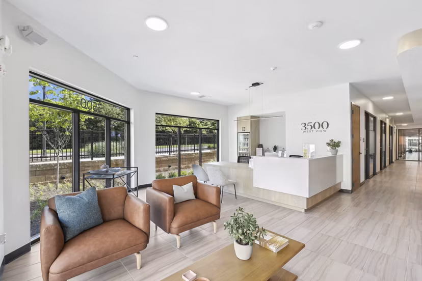 Clubhouse interior with modern furnishings at 3500 West View Apartments, offering luxury spaces and amenities for residents