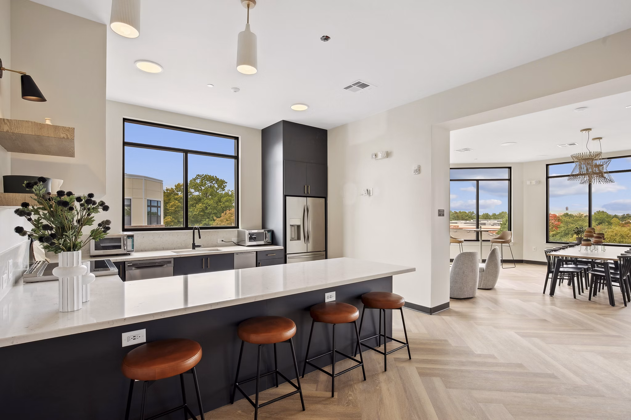 Clubhouse at 3500 West View Apartments featuring modern design and cozy furnishings, perfect for social gatherings and relaxation