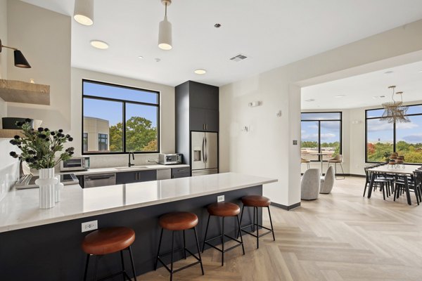Clubhouse at 3500 West View Apartments featuring modern design and cozy furnishings, perfect for social gatherings and relaxation