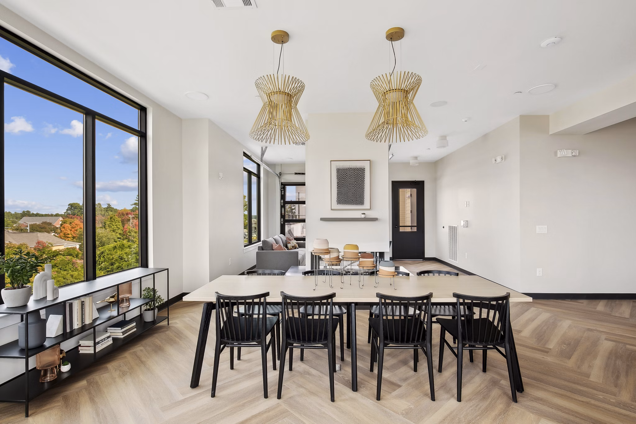 Clubhouse with modern furnishings and ample seating at 3500 West View Apartments, offering a relaxing community space for residents