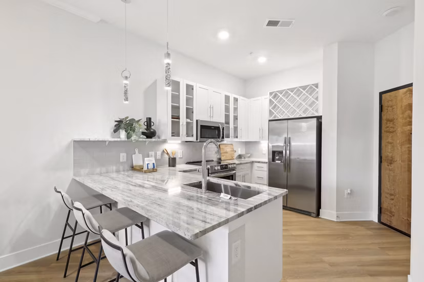 Modern kitchen with stainless steel appliances at 3500 West View Apartments