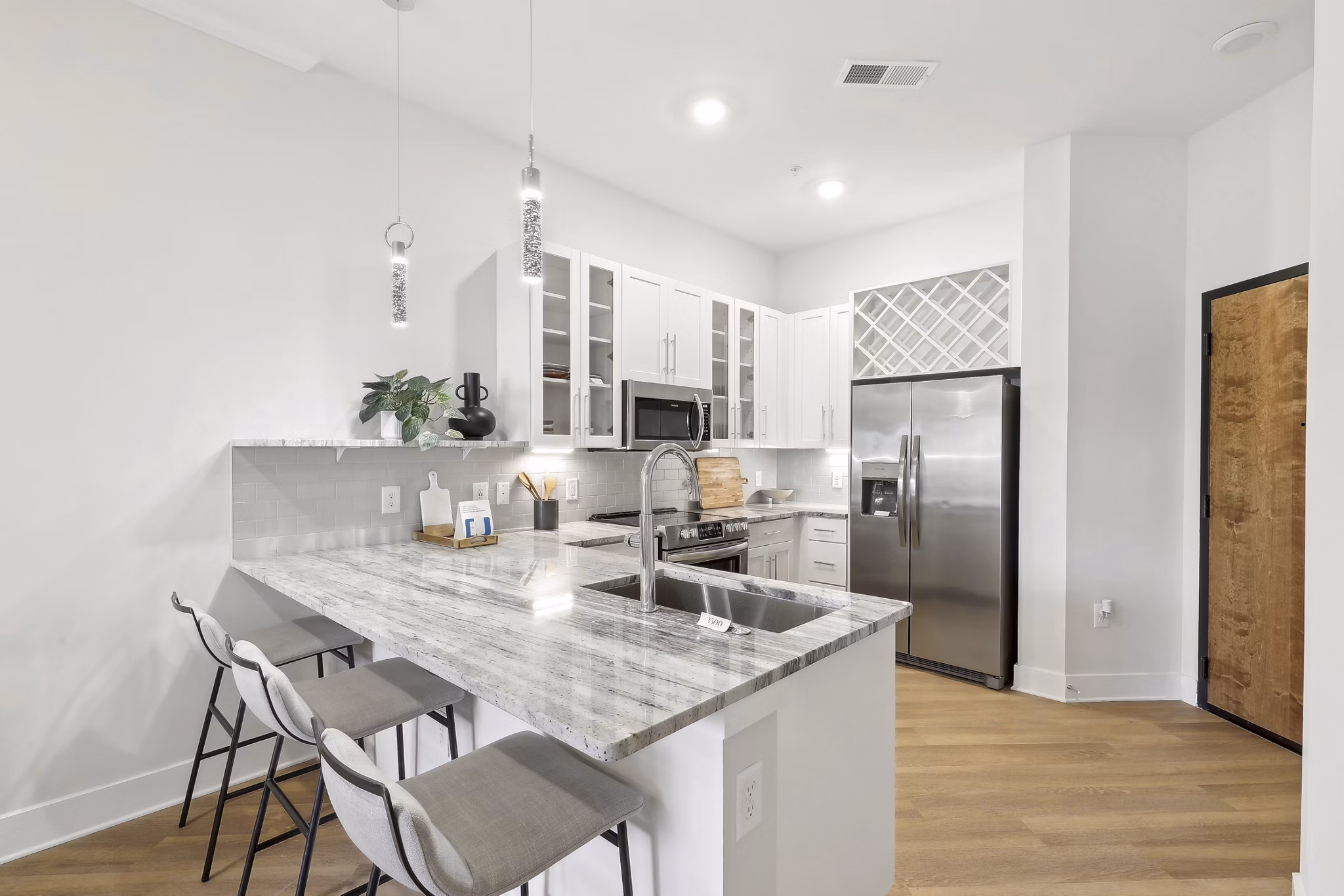 Modern kitchen with stainless steel appliances at 3500 West View Apartments