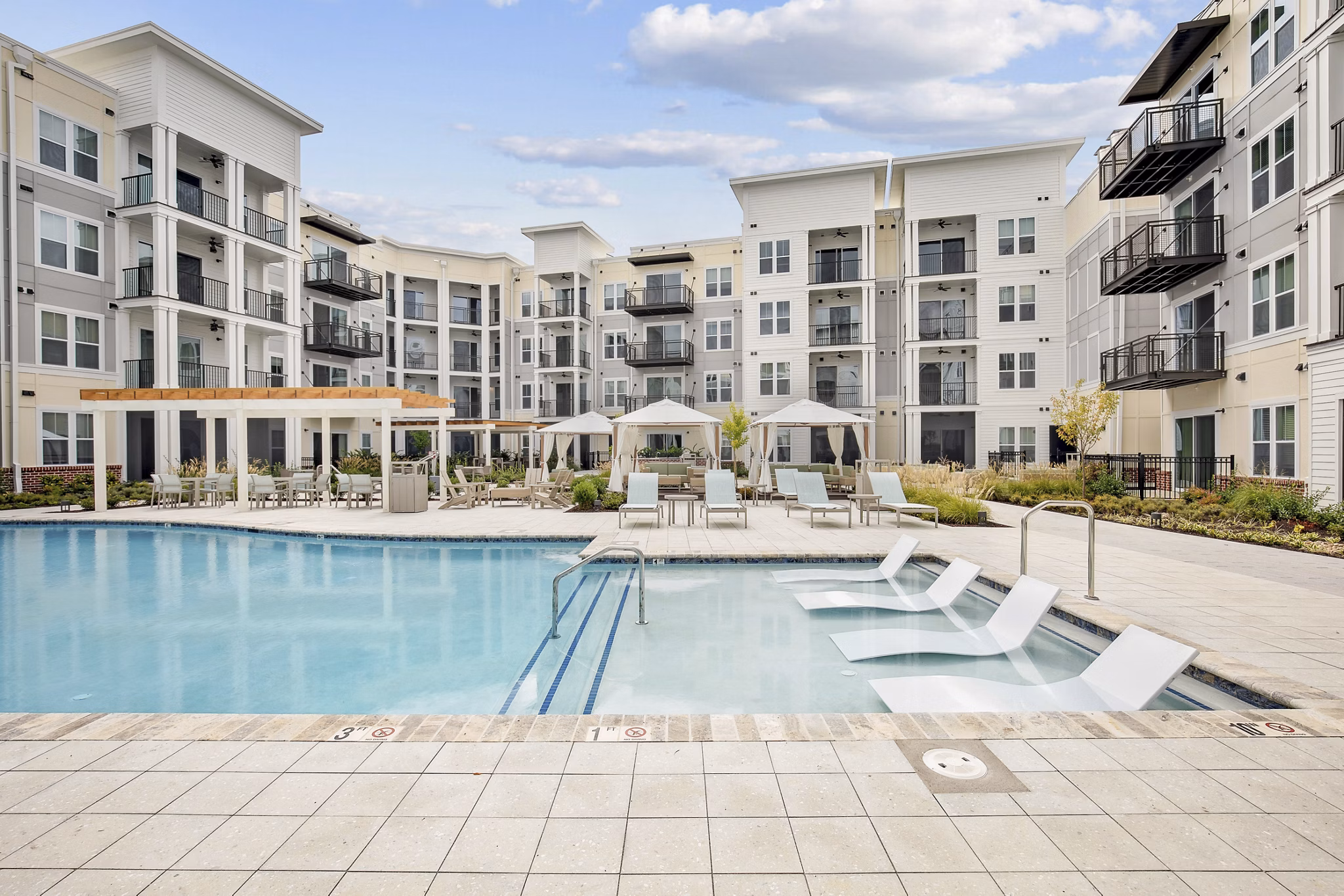 Resort-style pool at 3500 West View Apartments, offering relaxation and leisure for residents in a luxurious setting