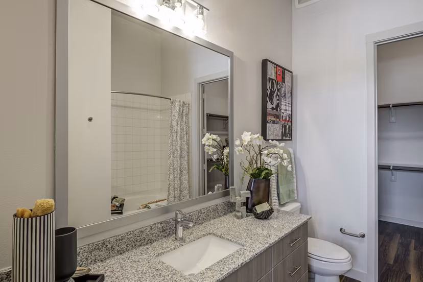 Modern bathroom with sleek fixtures in Prose Prominence Apartments, offering luxury living in a prime location