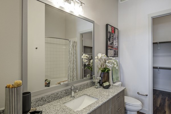 Modern bathroom with sleek fixtures in Prose Prominence Apartments, offering luxury living in a prime location