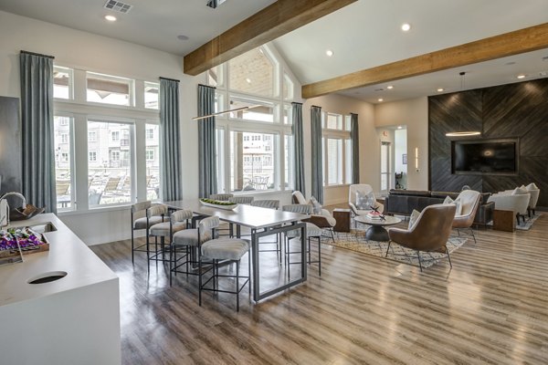 Clubhouse featuring modern design and comfortable seating at Prose Prominence Apartments
