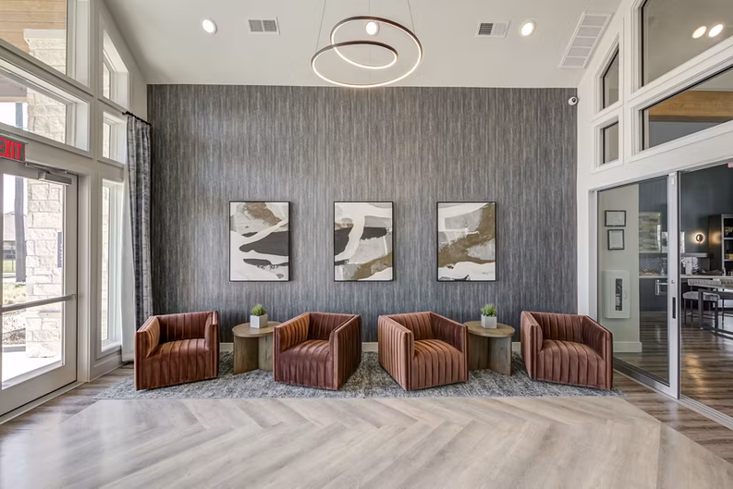 Modern clubhouse with stylish seating and open spaces at Prose Prominence Apartments