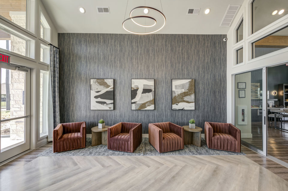 Modern clubhouse with stylish seating and open spaces at Prose Prominence Apartments
