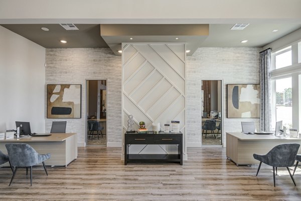 Modern clubhouse with stylish seating and entertainment area at Prose Prominence Apartments