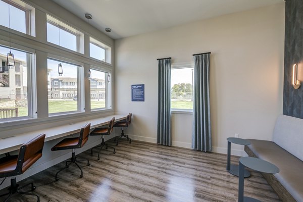 Spacious clubhouse with modern decor at Prose Prominence Apartments offering luxury amenities and social spaces