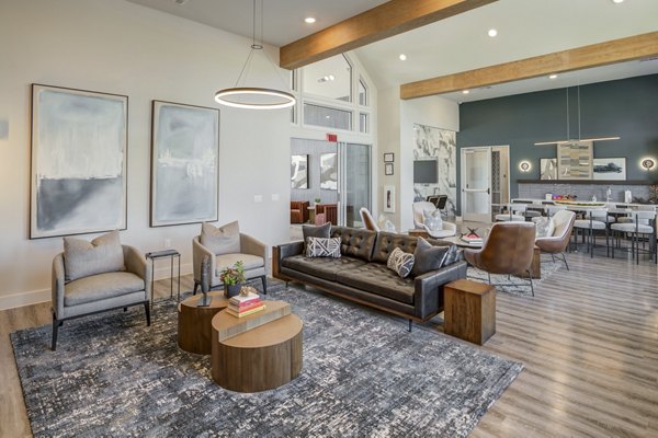 Clubhouse featuring contemporary design elements at Prose Prominence Apartments, a Greystar community