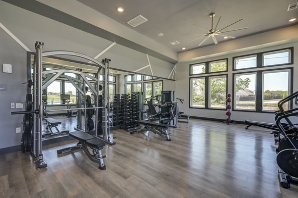 Fitness center with state-of-the-art equipment at Prose Prominence Apartments