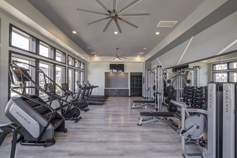 State-of-the-art fitness center at Prose Prominence Apartments featuring modern exercise equipment and spacious workout areas