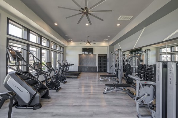 State-of-the-art fitness center at Prose Prominence Apartments featuring modern exercise equipment and spacious workout areas