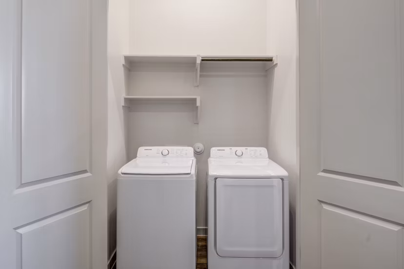 Laundry room with state-of-the-art appliances in Prose Prominence Apartments