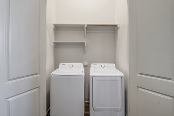 laundry room at Prose Prominence Apartments