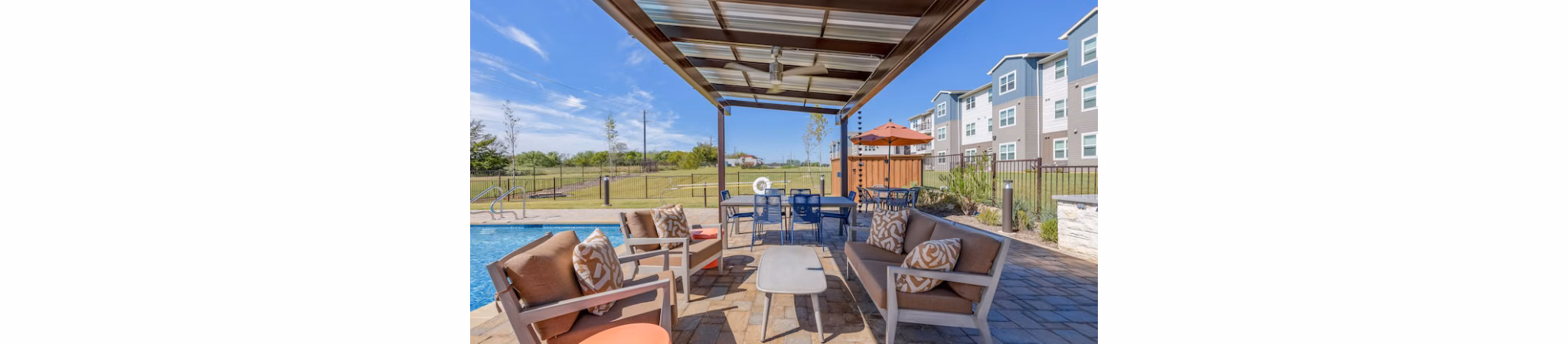 Prose Prominence: Scenic patio in luxury apartment community perfect for outdoor relaxation