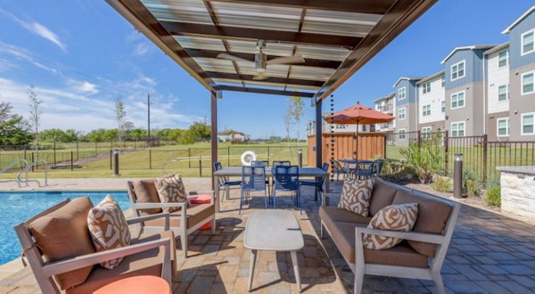 Prose Prominence: Scenic patio in luxury apartment community perfect for outdoor relaxation