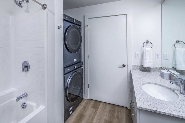 bathroom and laundry room at Prose Battle Ground Apartments